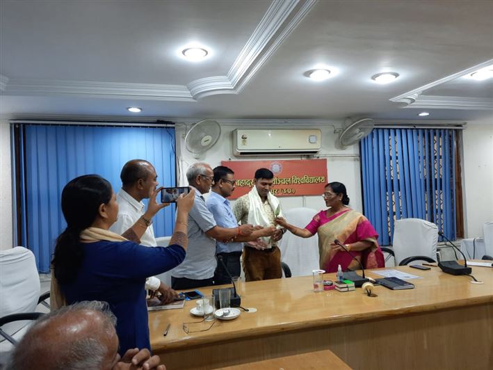 Image of Felicitation by VC after Award